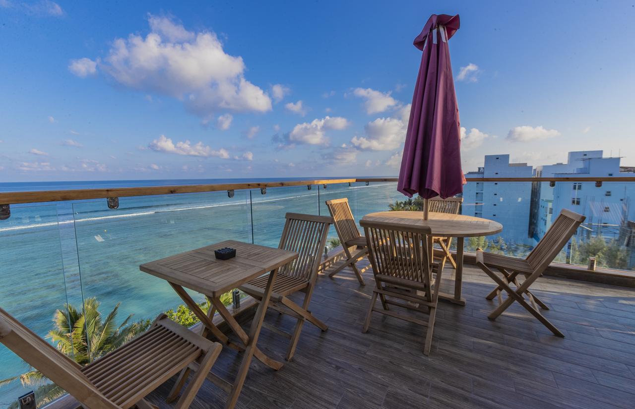 Rooftop dining at Coral Grand